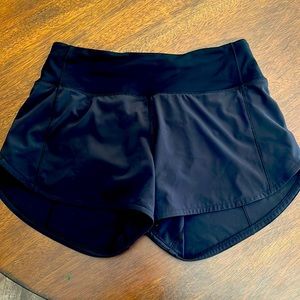 Lululemon Speed Up Low Rose shorts. Size 4